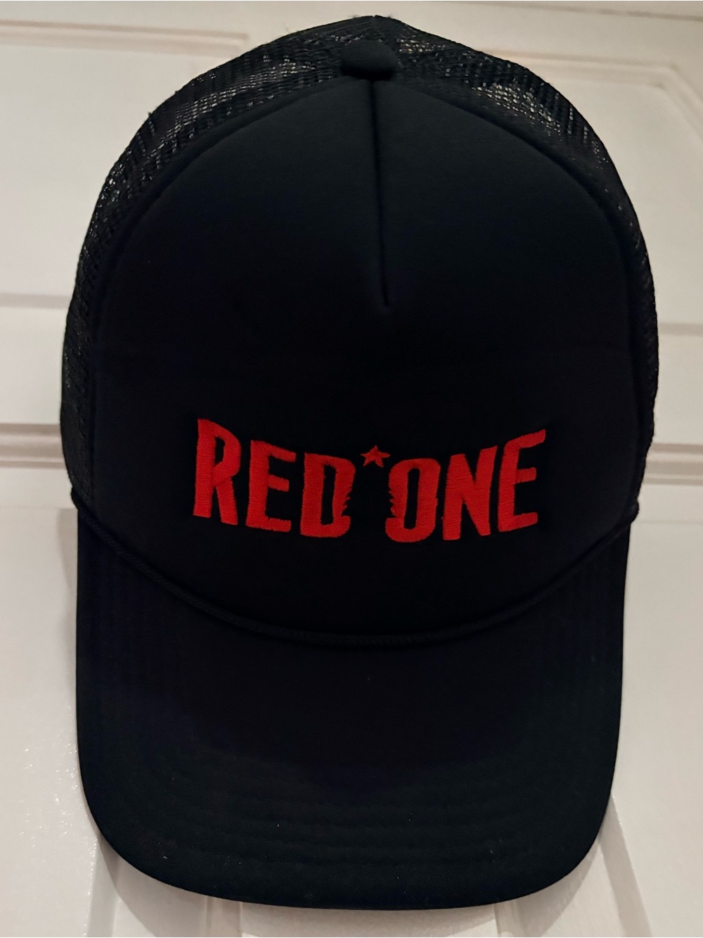 Red One Black Trucker Hat with Red "RED ONE" Embroidery